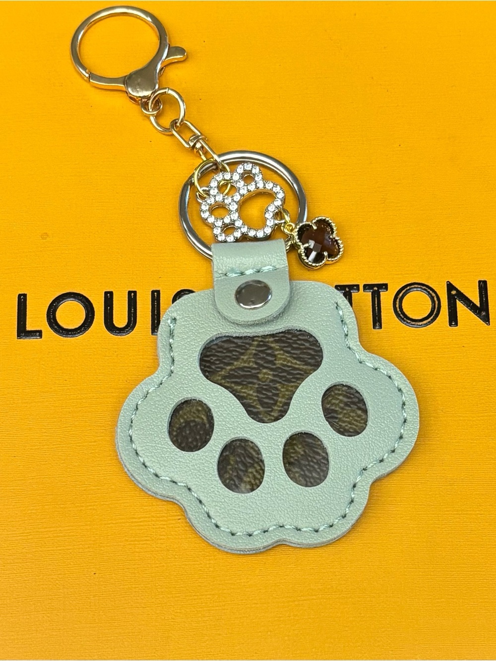 Louis Vuitton Dog Paw Print Bag Charm, paw rhinestone/ clover.
Keychain,Upcycled